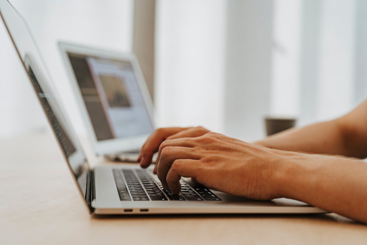 Laptop screen showing professional coding, representing web design and development services